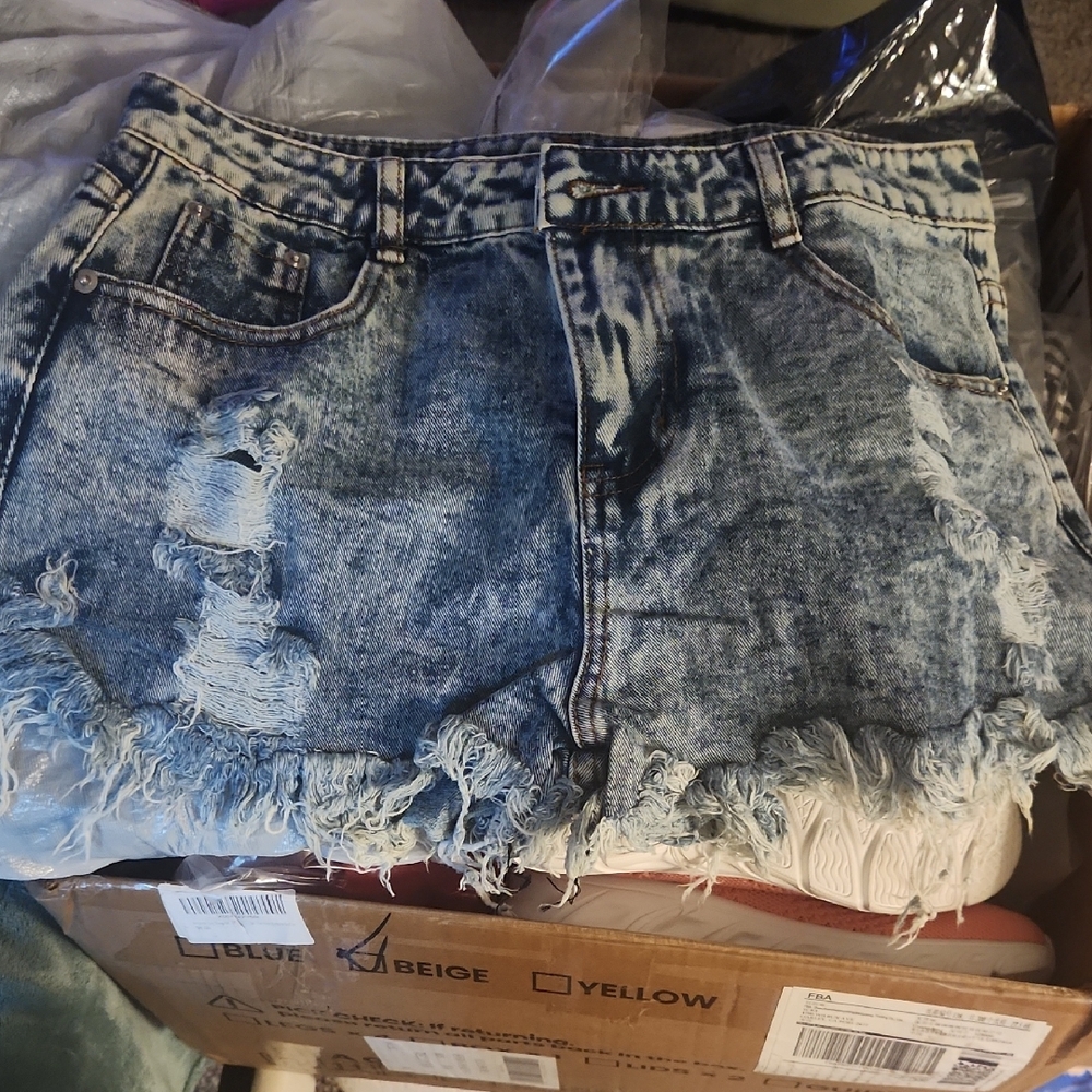 Women's Light Blue Distressed Denim Shorts with Frayed Hem